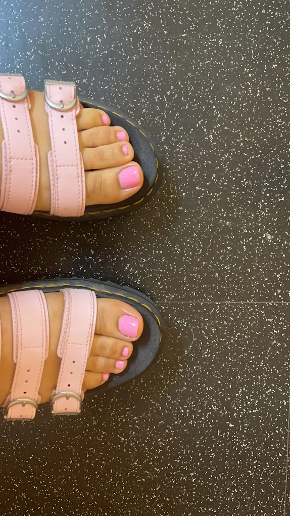 Bright pink pedicure with sandals